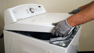 Как проводится ремонт стиральных машин с вертикальной загрузкой?
