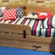 Детские кровати-диваны для мальчиков: многообразие моделей и особенности выбора